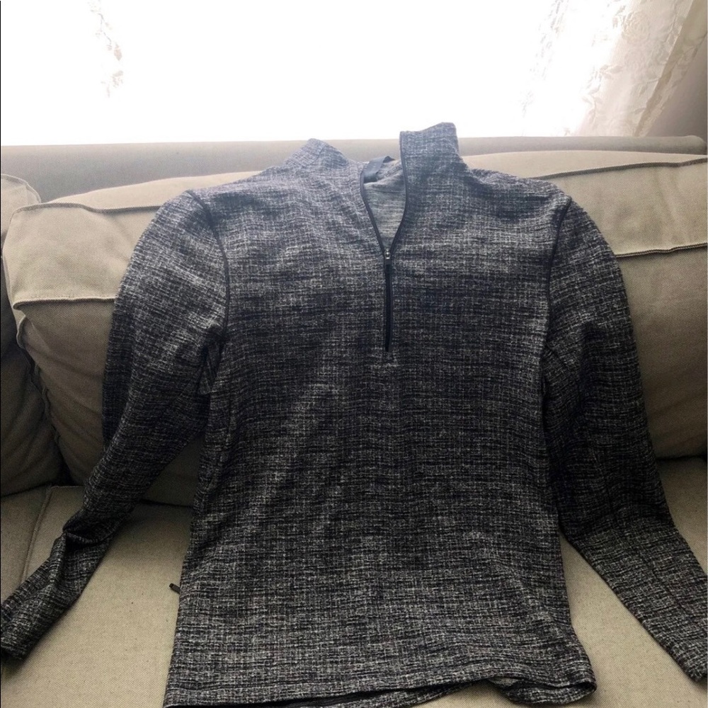 Lululemon Long sleeve pullover with side pocket.